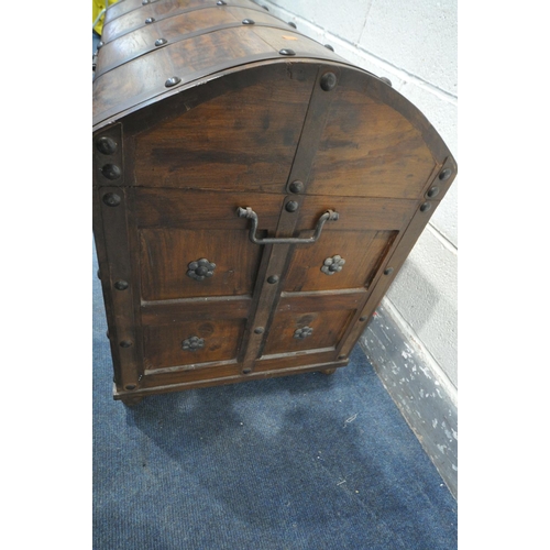 1284 - A HARDWOOD DOME TOP TRUNK, with metal banding, and iron handles, on bun feet, width 78cm x depth 55c... 