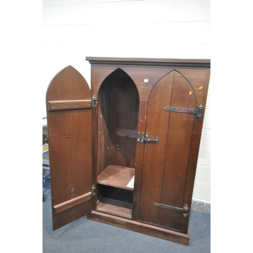 1290 - A GOTHIC STAINED PINE TWO DOOR CUPBOARD, width 115cm x depth 59cm x height 176cm (condition:-both do... 