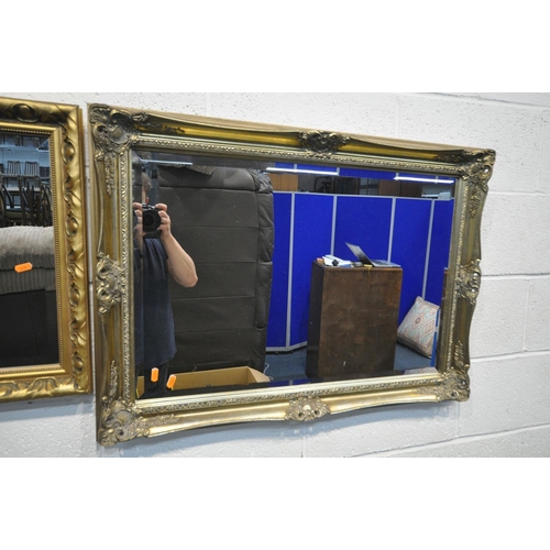 1298 - A GILT FRAMED BEVELLED EDGE WALL MIRROR, 90cm x 64cm, and another wall mirror (2)