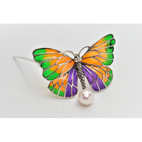 23 - A PLIQUE A JOUR BROOCH, designed as a white metal butterfly, displaying green, orange and purple pli... 