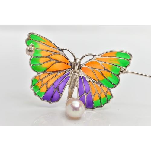 23 - A PLIQUE A JOUR BROOCH, designed as a white metal butterfly, displaying green, orange and purple pli... 