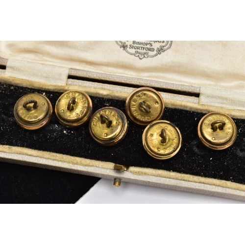 26 - A CASED SET OF SIX GUINNESS DRESS STUDS, six advertising dress studs depicting a seal, tortoise, two... 