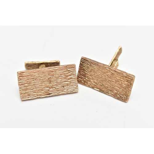 28 - A PAIR OF 9CT ROSE GOLD CUFFLINKS, rectangular in form with bark effect design, approximate dimensio... 