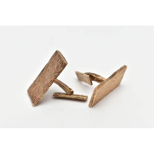 28 - A PAIR OF 9CT ROSE GOLD CUFFLINKS, rectangular in form with bark effect design, approximate dimensio... 