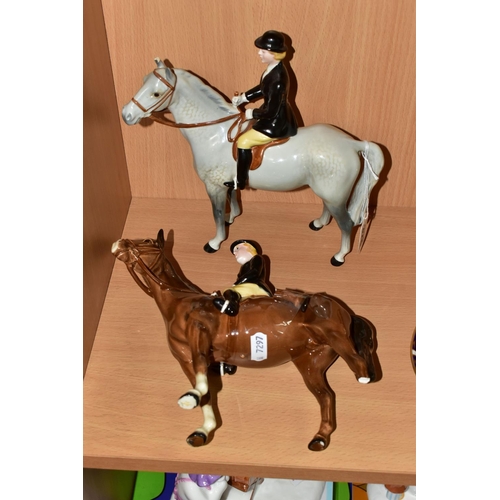 328 - TWO BESWICK HUNTSWOMAN FIGURINES, model no 1730, one has a grey horse, the other brown, height 21cm ... 