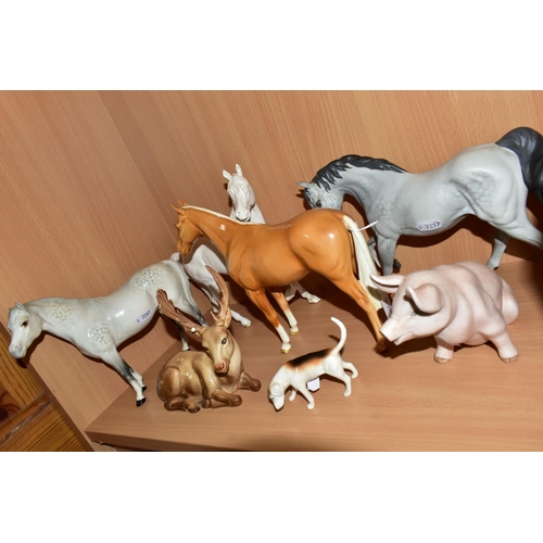 332 - A GROUP OF BESWICK HORSES AND OTHER ANIMALS, comprising a palomino Imperial model no 1557, a grey Ar... 