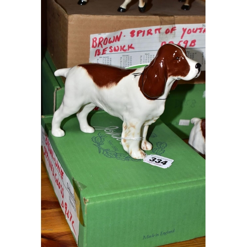 334 - A GROUP OF BESWICK AND ROYAL DOULTON HORSES AND DOGS, comprising a boxed brown Beswick Spirit of Fre... 