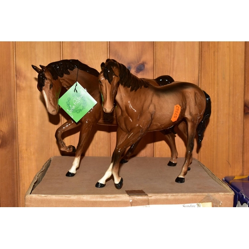 334 - A GROUP OF BESWICK AND ROYAL DOULTON HORSES AND DOGS, comprising a boxed brown Beswick Spirit of Fre... 