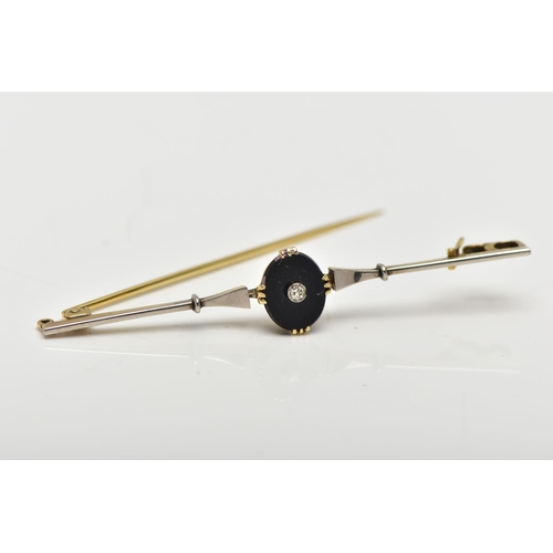 35 - A YELLLOW METAL DIAMOND SET BAR BROOCH, centring on an oval onyx panel set with a single cut diamond... 