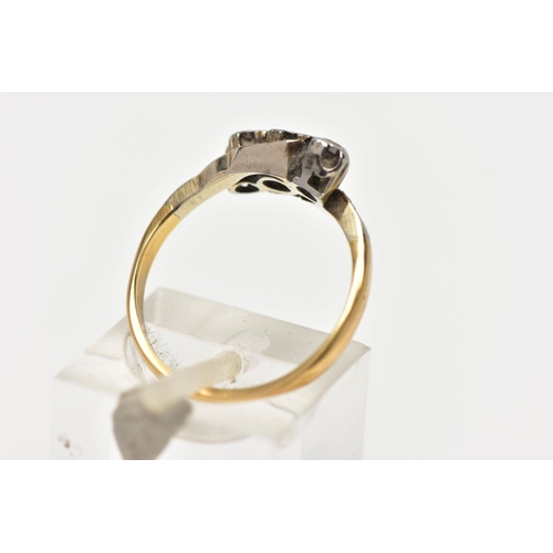 4 - A MID 20TH CENTURY WHITE AND YELLOW METAL DIAMOND THREE STONE RING, set with graduating round brilli... 