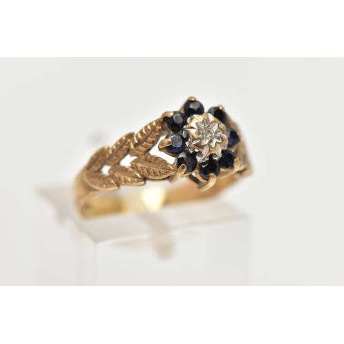 47 - A 9CT GOLD DIAMOND AND SAPPHIRE CLUSTER RING, the illusion set single cut diamond, within a circular... 