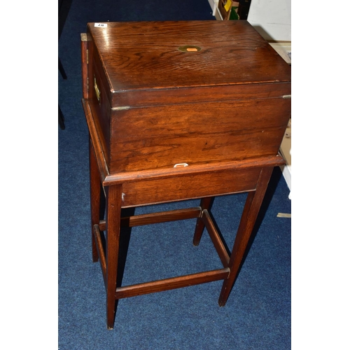 87 - A WOODEN FREE STANDING INCOMPLETE CANTEEN, comprising cutlery with names to include 'Robert F Mosley... 