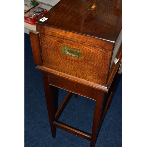 87 - A WOODEN FREE STANDING INCOMPLETE CANTEEN, comprising cutlery with names to include 'Robert F Mosley... 