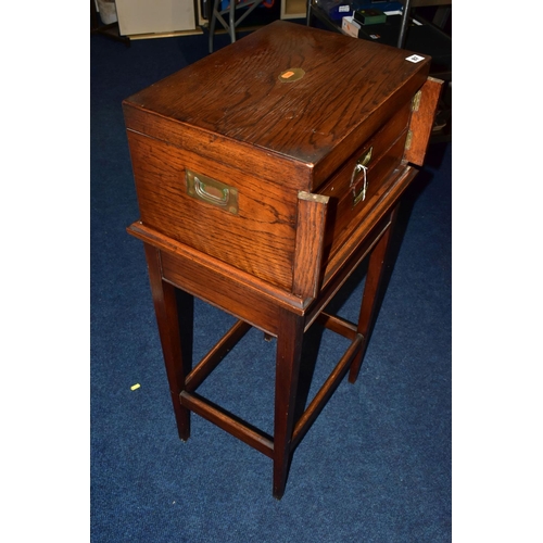 87 - A WOODEN FREE STANDING INCOMPLETE CANTEEN, comprising cutlery with names to include 'Robert F Mosley... 