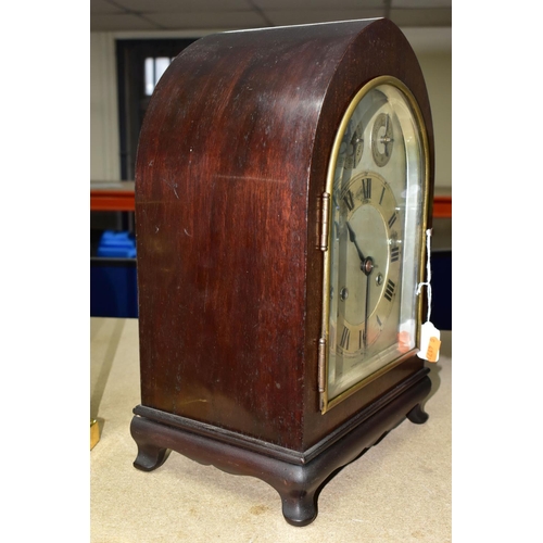 352 - AN H.A.C MANTEL CLOCK MADE IN WURTTEMBERG GERMANY, early 20th Century with key and pendulum, in a Go... 