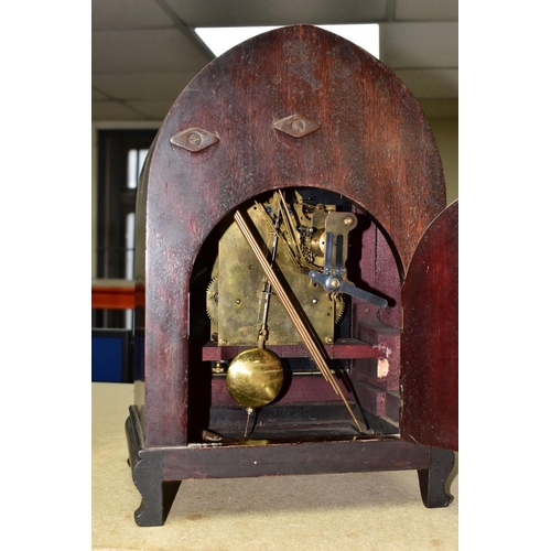 352 - AN H.A.C MANTEL CLOCK MADE IN WURTTEMBERG GERMANY, early 20th Century with key and pendulum, in a Go... 