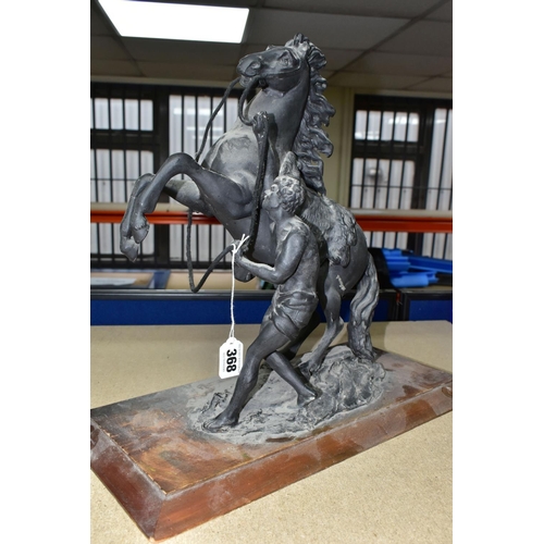 368 - A CAST FIGURE OF THE MARLEY HORSES, in black on a wooden plinth, height 38cm, together with a pair o... 