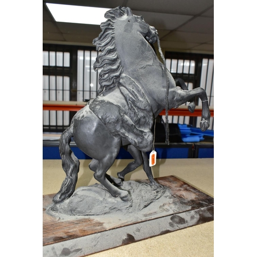 368 - A CAST FIGURE OF THE MARLEY HORSES, in black on a wooden plinth, height 38cm, together with a pair o... 