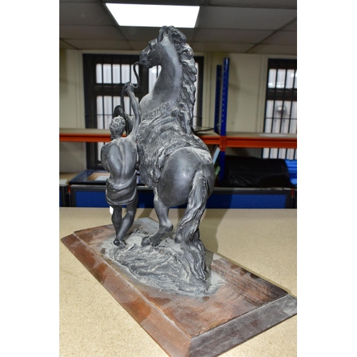 368 - A CAST FIGURE OF THE MARLEY HORSES, in black on a wooden plinth, height 38cm, together with a pair o... 