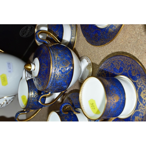 404 - A WEDGWOOD DEMITASSE COFFEE SET, comprising six coffee cans, six saucers, coffee pot, covered sugar ... 