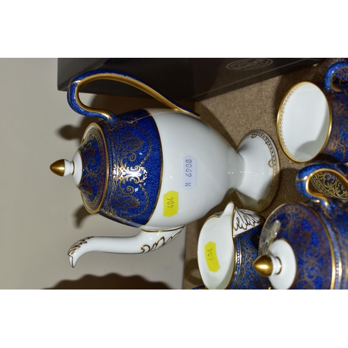 404 - A WEDGWOOD DEMITASSE COFFEE SET, comprising six coffee cans, six saucers, coffee pot, covered sugar ... 