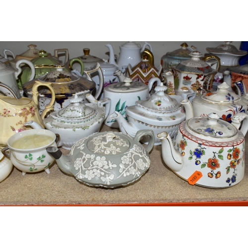 410 - A COLLECTION OF TEAPOTS AND OTHER TEA WARES, to include approximately twenty teapots, a nineteenth c... 