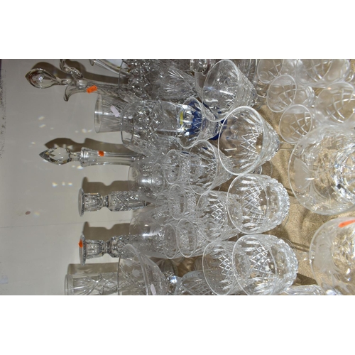 412 - A GROUP OF CUT CRYSTAL AND OTHER GLASS WARES, sixty to seventy pieces to include a cut crystal table... 