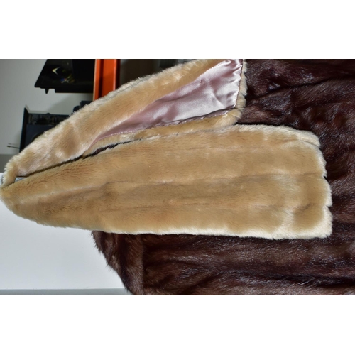 419 - TWO UNBRANDED FURS AND WALKING STICKS ETC, comprising a brown fur coat, a light brown jacket, a faux... 