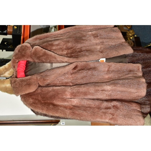 419 - TWO UNBRANDED FURS AND WALKING STICKS ETC, comprising a brown fur coat, a light brown jacket, a faux... 