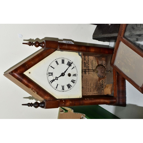 423 - A WINTERHALDER AND HOFMEIER OAK CARVED OAK MANTLE CLOCK, the silvered dial having roman numeral hour... 