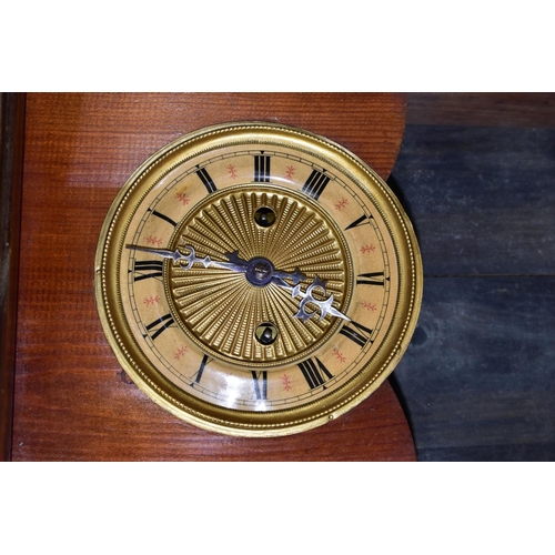 437 - TWO MANTEL CLOCKS, comprising an Art Nouveau mantel clock, the solid wooden case of compressed oval ... 