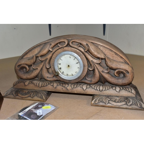 437 - TWO MANTEL CLOCKS, comprising an Art Nouveau mantel clock, the solid wooden case of compressed oval ... 