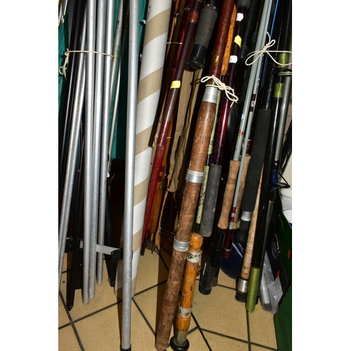 451 - A LARGE QUANTITY OF VINTAGE FISHING RODS AND EQUIPMENT, comprising a 'The East Lancashire Regiment' ... 