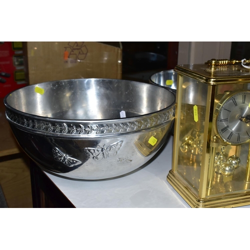 452 - TWO PORTMEIRION ALUMINIUM BOWLS AND A BRASS MANTEL CLOCK, the bowls have the iconic Botanic Garden l... 