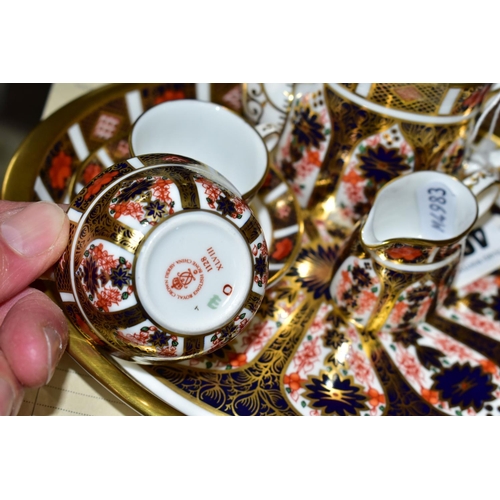 461 - A MINIATURE ROYAL CROWN DERBY IMARI 1128 TEA SET AND SERVING TRAY, comprising on oval serving tray, ... 