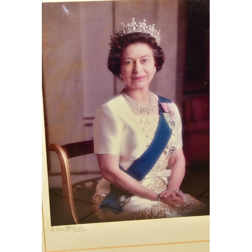 467 - A PHOTOGRAPHIC PRINT OF HER MAJESTY QUEEN ELIZABETH II, photographed by Constantine, signed to the m... 