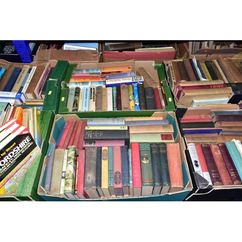 497 - BOOKS, seven boxes conytaining approximately 230 - 240 titles in hardback and paperback format, subj... 