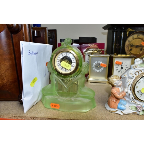 402 - A QUANTITY OF CLOCKS, comprising a Ron Coles native Australian Red Burl wood mantel clock, a wooden ... 