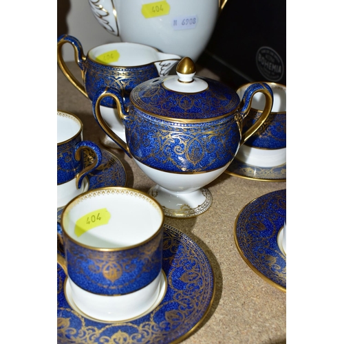 404 - A WEDGWOOD DEMITASSE COFFEE SET, comprising six coffee cans, six saucers, coffee pot, covered sugar ... 