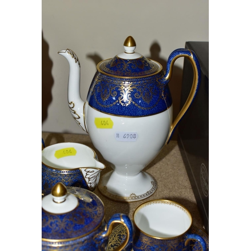 404 - A WEDGWOOD DEMITASSE COFFEE SET, comprising six coffee cans, six saucers, coffee pot, covered sugar ... 