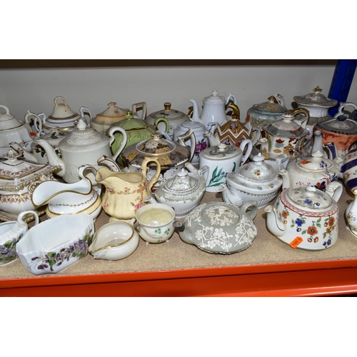 410 - A COLLECTION OF TEAPOTS AND OTHER TEA WARES, to include approximately twenty teapots, a nineteenth c... 