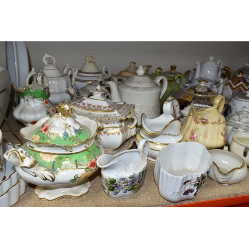 410 - A COLLECTION OF TEAPOTS AND OTHER TEA WARES, to include approximately twenty teapots, a nineteenth c... 