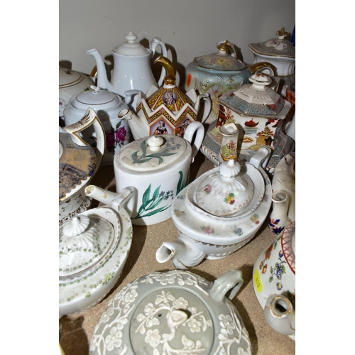 410 - A COLLECTION OF TEAPOTS AND OTHER TEA WARES, to include approximately twenty teapots, a nineteenth c... 