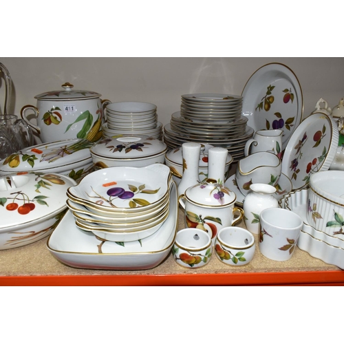 411 - A FIFTY EIGHT PIECE ROYAL WORCESTER EVESHAM DINNER SERVICE, comprising a large twin handled covered ... 