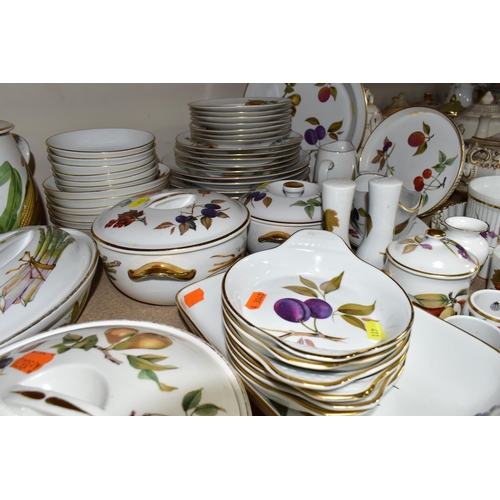 411 - A FIFTY EIGHT PIECE ROYAL WORCESTER EVESHAM DINNER SERVICE, comprising a large twin handled covered ... 