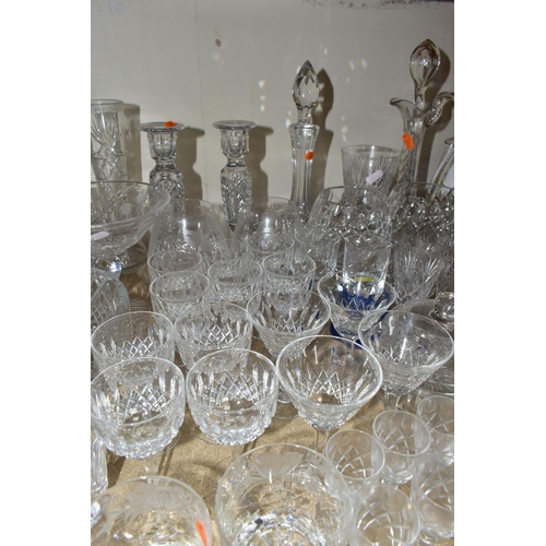 412 - A GROUP OF CUT CRYSTAL AND OTHER GLASS WARES, sixty to seventy pieces to include a cut crystal table... 