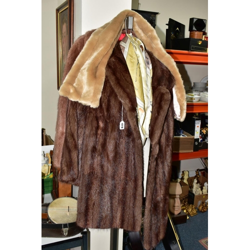 419 - TWO UNBRANDED FURS AND WALKING STICKS ETC, comprising a brown fur coat, a light brown jacket, a faux... 