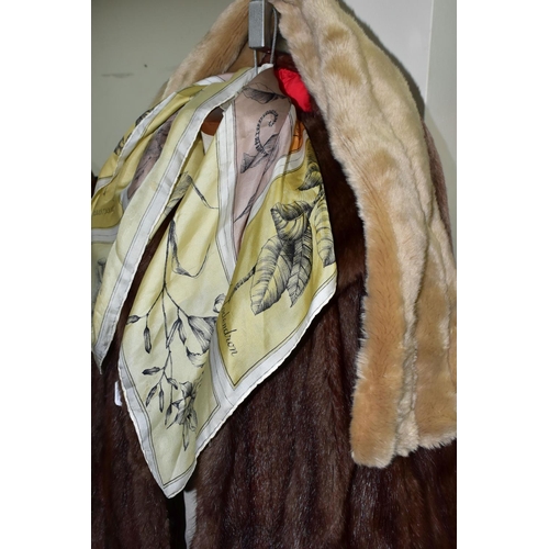 419 - TWO UNBRANDED FURS AND WALKING STICKS ETC, comprising a brown fur coat, a light brown jacket, a faux... 