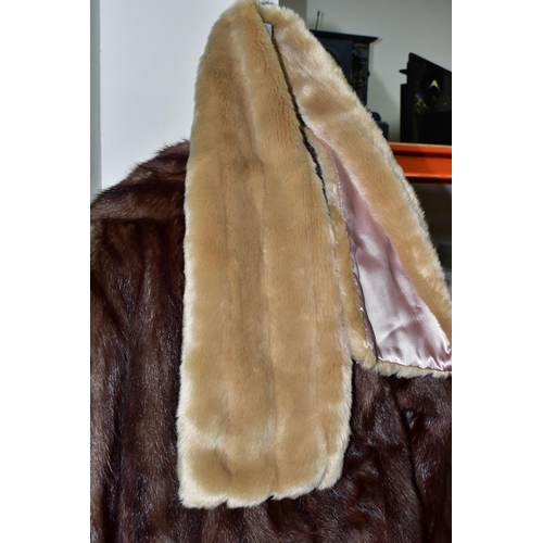 419 - TWO UNBRANDED FURS AND WALKING STICKS ETC, comprising a brown fur coat, a light brown jacket, a faux... 