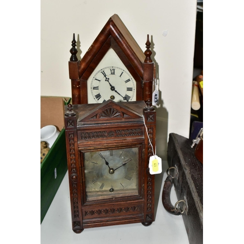 423 - A WINTERHALDER AND HOFMEIER OAK CARVED OAK MANTLE CLOCK, the silvered dial having roman numeral hour... 